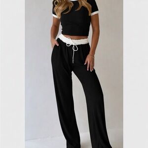 Two Piece Black Crop Top and Wide Leg Pants.